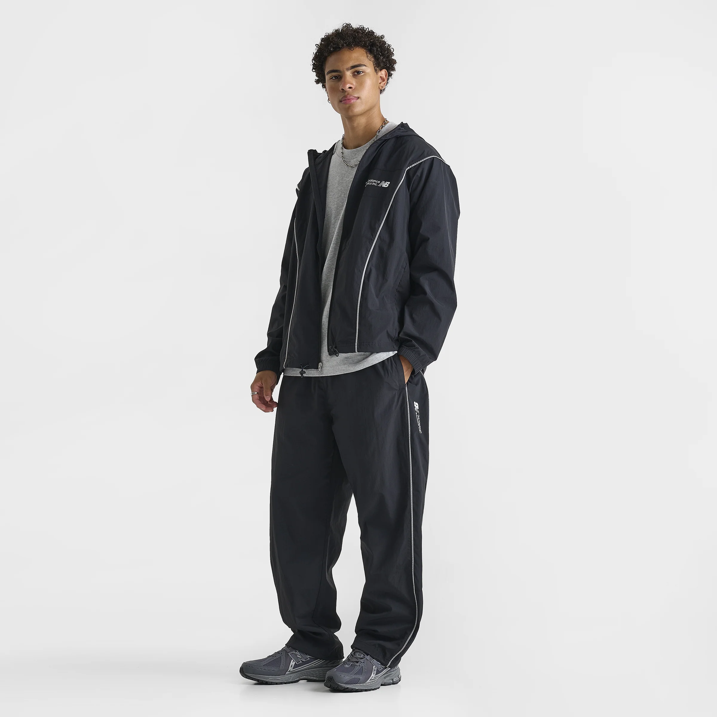 New Balance Vision Woven Track Pants Black / 3M Reflective - Image 6